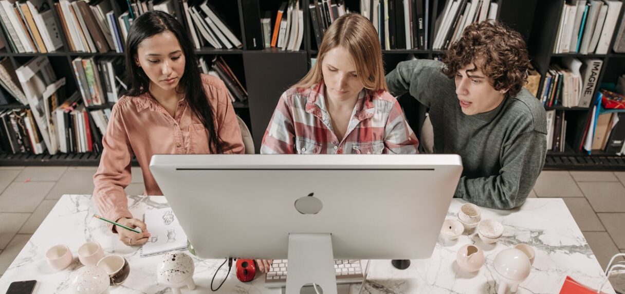 team reviewing ecommerce website design and structure before Shopify migration