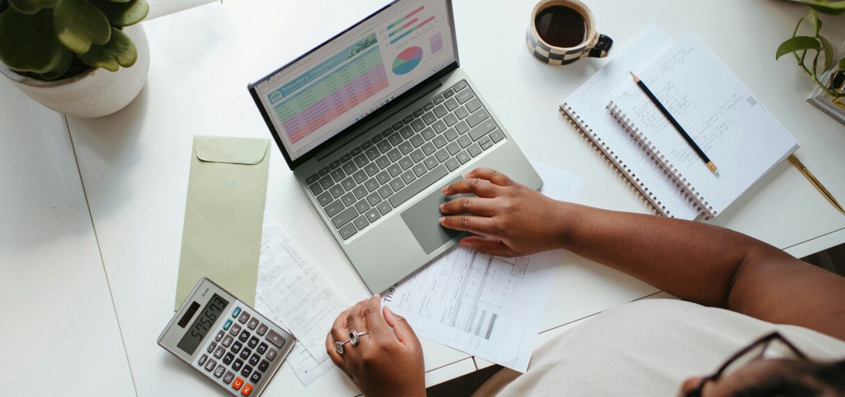 Reviewing a Shopify development quote on a laptop