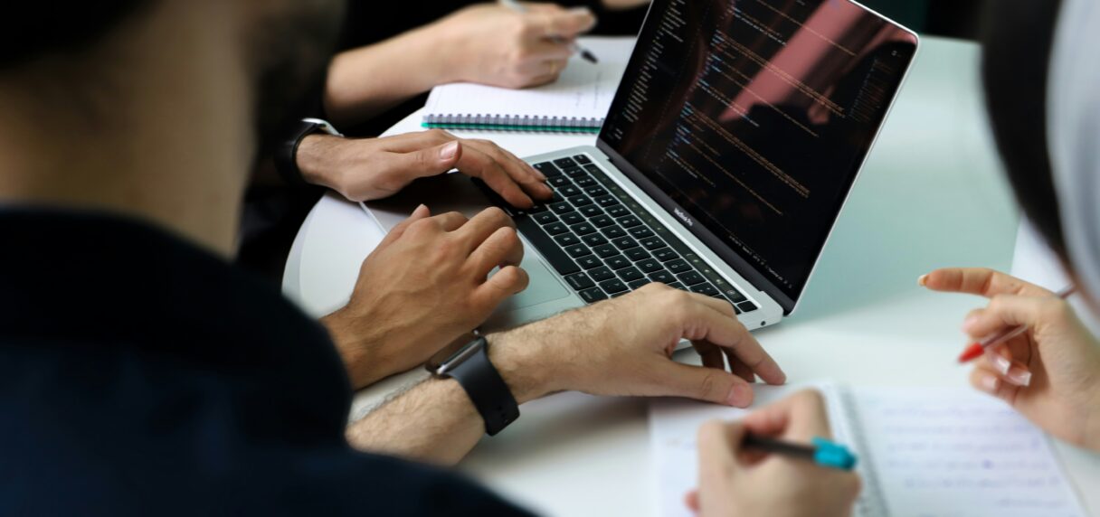 Team discussing Shopify Plus vs Advanced upgrade