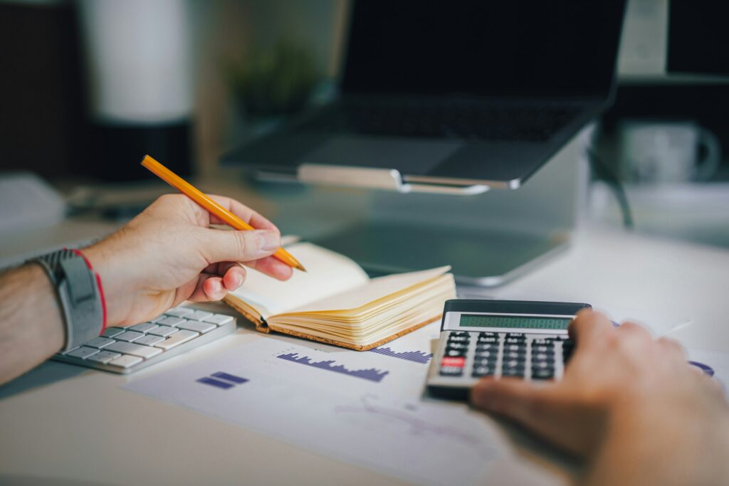 Calculating BigCommerce and Shopify plan costs with a calculator and sales charts