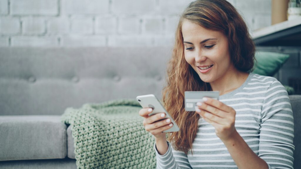 Shopper paying for a Black Friday order on a smartphone